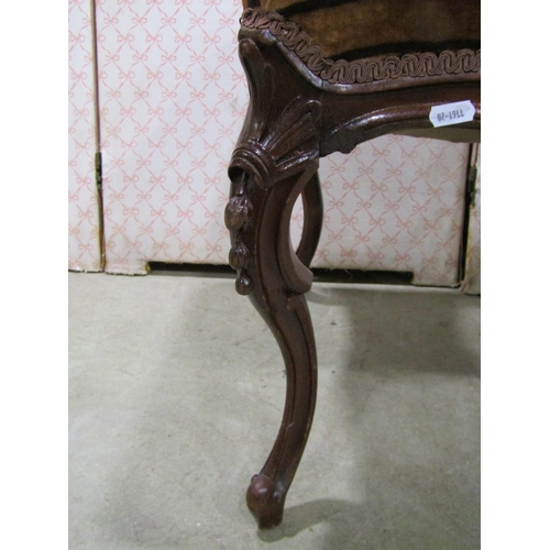 1237 - A 19th century centre stool raised on four cabriole supports with carved detail, and one other