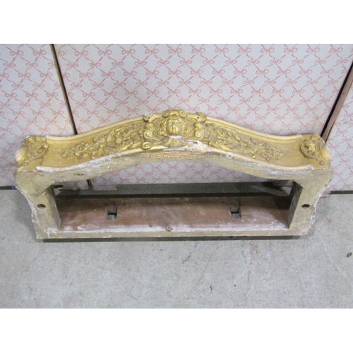 1306 - A 19th century gilt plaster console table frame with acanthus and other detail together with a gilde... 