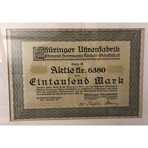 1736 - Four German certificates and bills, to include: A one hundred Reichsmark bill; A bill inscribed 'Obl... 