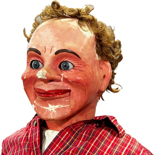 574 - A Ventriloquist Dummy, with working mouth and eyes, 90cm tall approximately.