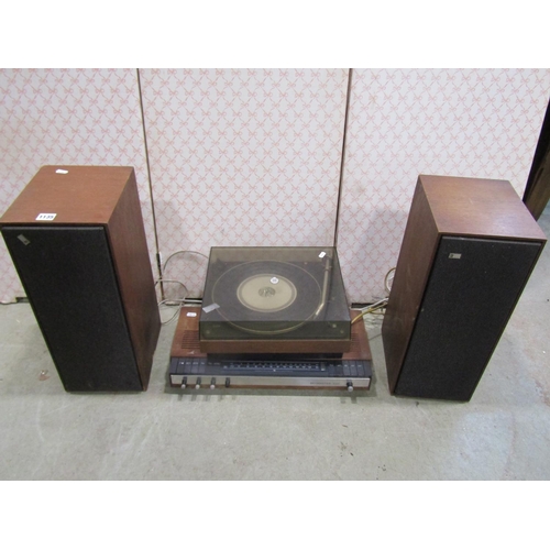 1135 - A vintage Bang & Olufsen audio set comprising Beomaster 1000, a 1000 Beogram record deck, and a pair... 