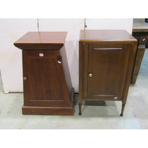 1211 - A square cut and tapering cupboard enclosed by a panelled door, together with a further oak locker