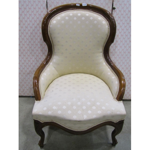 1230 - A Victorian style drawing room chair with upholstered finish