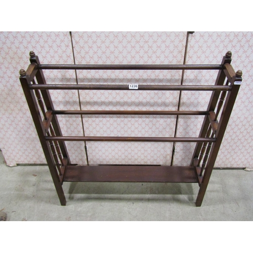 1236 - An Edwardian walnut clothes horse of tapering form