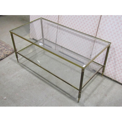 1238 - A Regency style brass framed two tier occasional table with glass panel, 90cm x 46cm x 41cm high