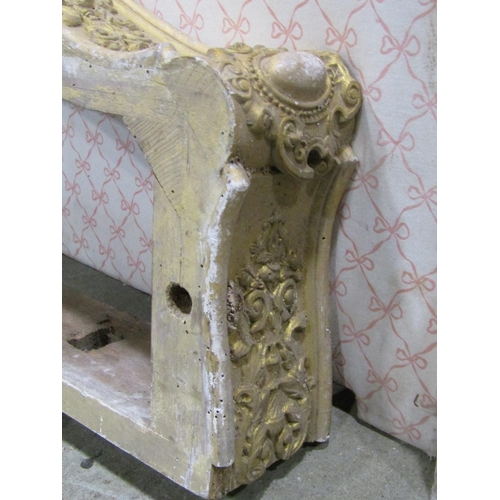 1306 - A 19th century gilt plaster console table frame with acanthus and other detail together with a gilde... 