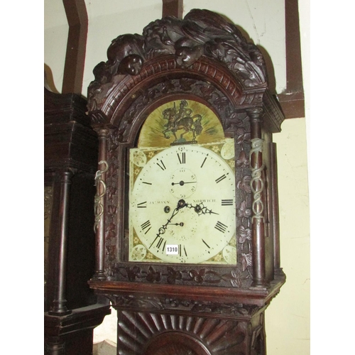 1310 - A 19th century oak longcase clock with heavy estate carving, the trunk detailing a knight fighting s... 