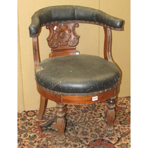 1327 - A 19th century mahogany library chair with carved splat, horseshoe shaped back and circular seat on ... 