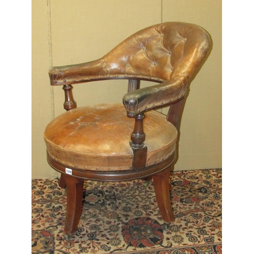 1329 - A 19th century library chair by Holland & Sons (stamped twice to legs) with revolving seat with orig... 