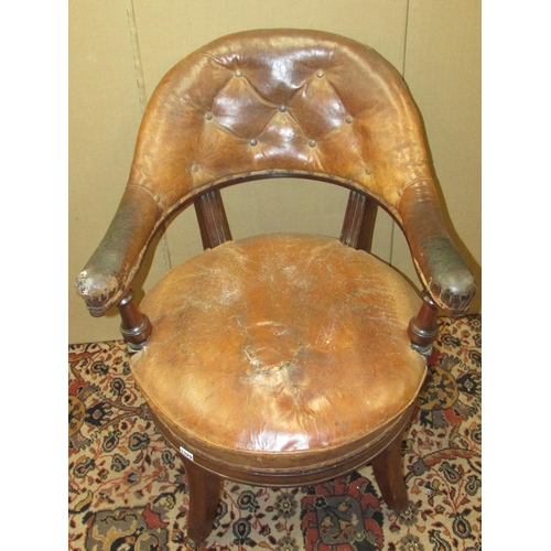 1329 - A 19th century library chair by Holland & Sons (stamped twice to legs) with revolving seat with orig... 