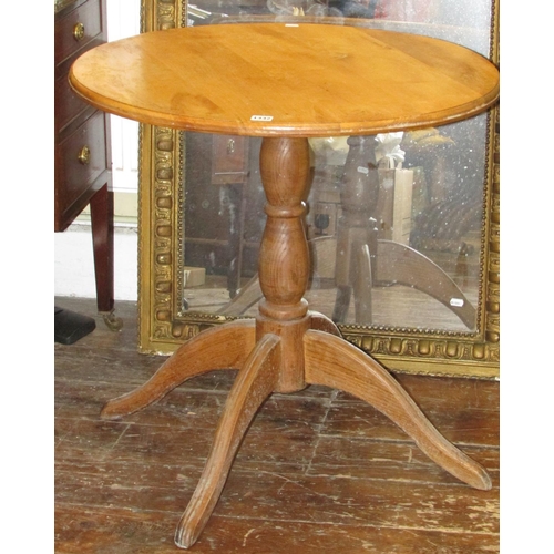 1332 - An old English style elm occasional table, the circular top on central pillar with quadruped