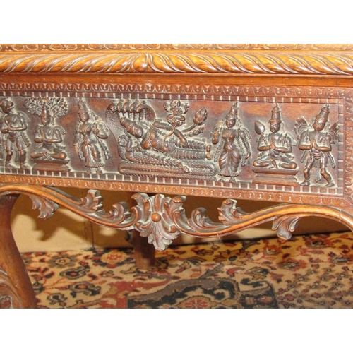 1343 - A 19th century Anglo Indian carved hardwood stool frame, with detailed repetitive character and foli... 