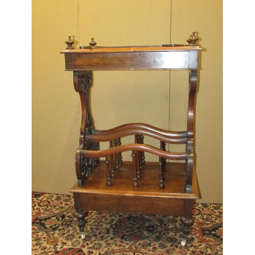 1358 - A Victorian walnut and figured walnut Canterbury watnot, raised on carved and pierced supports, inco... 