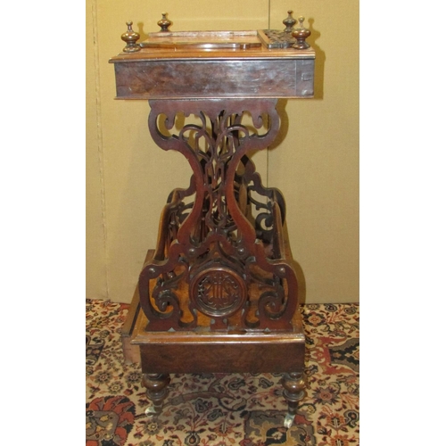 1358 - A Victorian walnut and figured walnut Canterbury watnot, raised on carved and pierced supports, inco... 