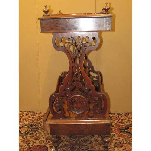 1358 - A Victorian walnut and figured walnut Canterbury watnot, raised on carved and pierced supports, inco... 