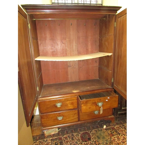 1380 - Georgian mahogany linen press the lower section enclosed by a series of four drawers, the upper sect... 