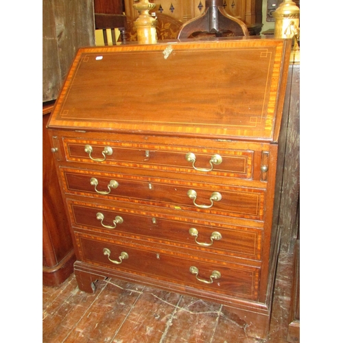 1397 - A good quality Edwardian mahogany bureau in the Georgian style, with four tapering frieze drawer, th... 