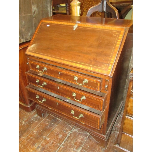 1397 - A good quality Edwardian mahogany bureau in the Georgian style, with four tapering frieze drawer, th... 