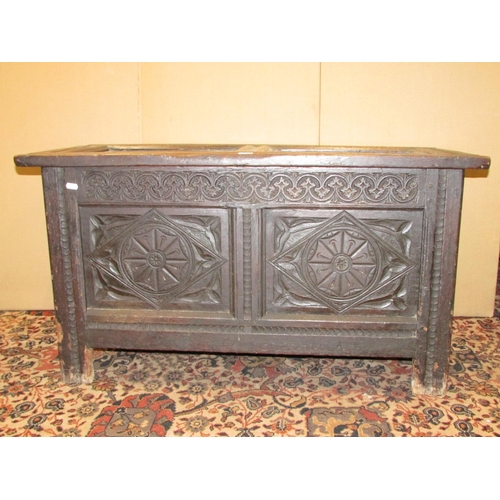 1403 - Early 18th century oak panelled coffer with carved finish, 105cm wide