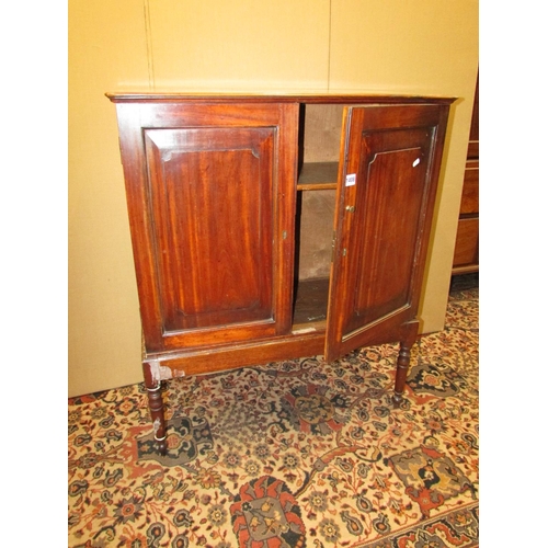 1408 - A Georgian satin wood cupboard enclosed by two fielded panelled doors, raised on an open framework, ... 