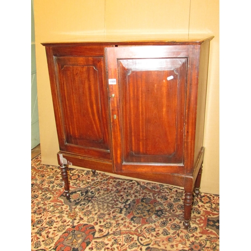 1408 - A Georgian satin wood cupboard enclosed by two fielded panelled doors, raised on an open framework, ... 