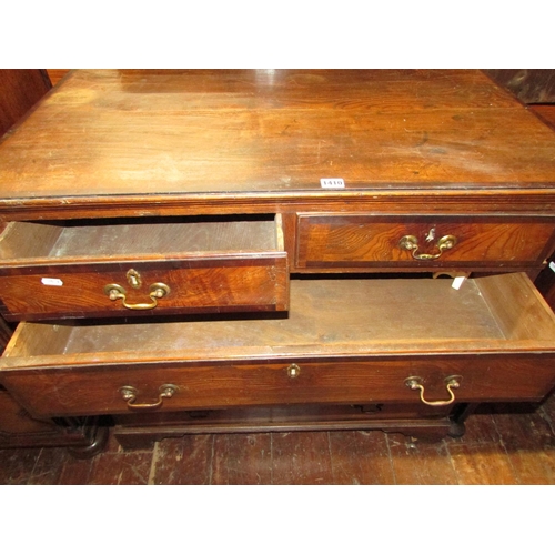 1410 - A Georgian country made chest of three long and two short graduated drawers, principally in ash wood... 