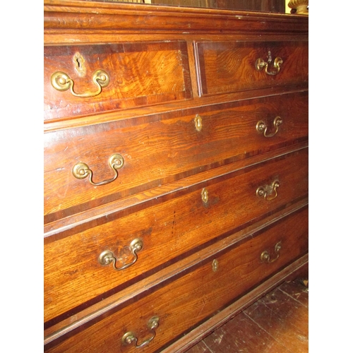 1410 - A Georgian country made chest of three long and two short graduated drawers, principally in ash wood... 