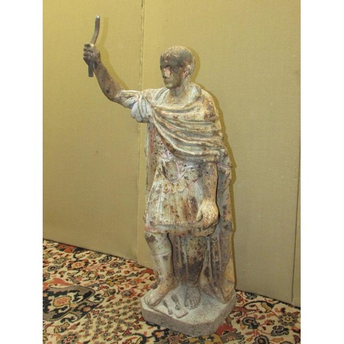 1432 - An antique cast iron figure of a Roman character one foot upon a dove with traces of painted finish,... 