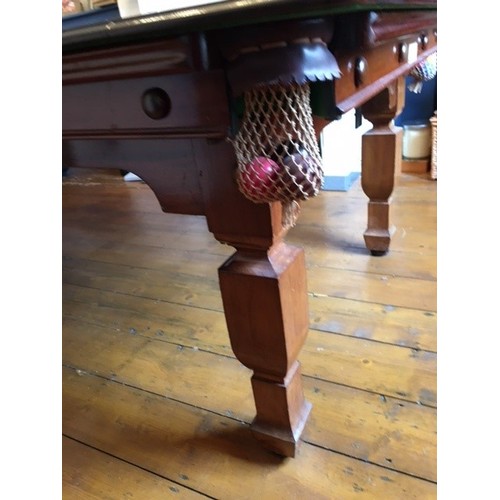 1436 - A Burroughes & Watts quarter size billiard/dinning table in mahogany raised on square cut supports, ... 