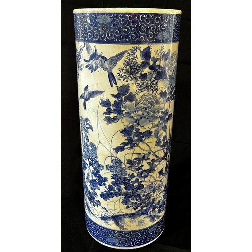 33 - A Japanese blue and white porcelain stick stand (A/F) 62 cm high x 25.5 cm diameter