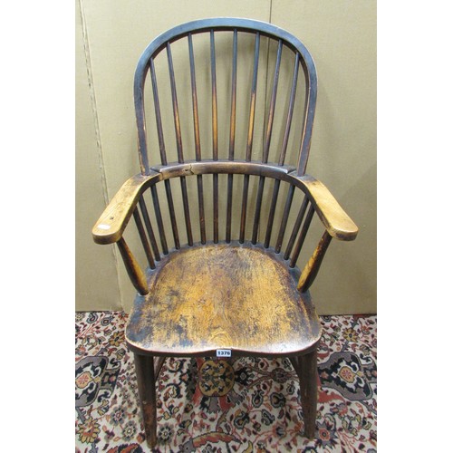 1376 - Two 19th century Windsor comb-back elbow chairs, in elm and beech (2)