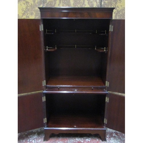 1275 - A drinks cabinet in the form of a reproduction Georgian style side cupboard enclosed by four doors r... 