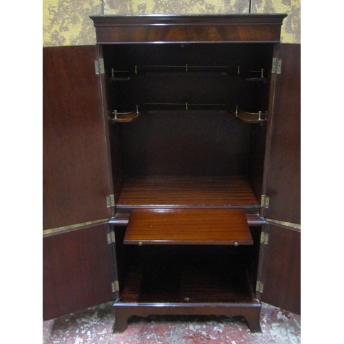 1275 - A drinks cabinet in the form of a reproduction Georgian style side cupboard enclosed by four doors r... 