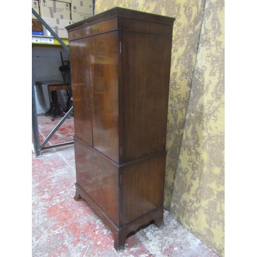 1275 - A drinks cabinet in the form of a reproduction Georgian style side cupboard enclosed by four doors r... 