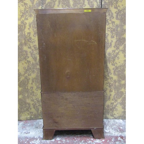 1275 - A drinks cabinet in the form of a reproduction Georgian style side cupboard enclosed by four doors r... 