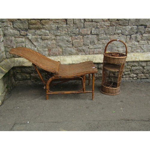 1254 - An Edwardian wicker conservatory chair with adjustable frame together with a wicker picnic stand