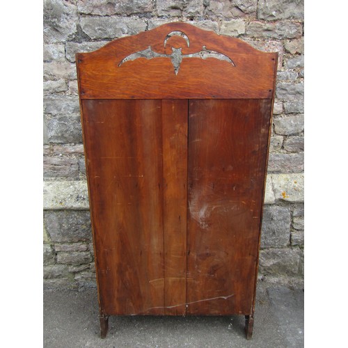 1121 - An early 20th century oak students bureau with strap hinges, the raised back with pierced detail of ... 