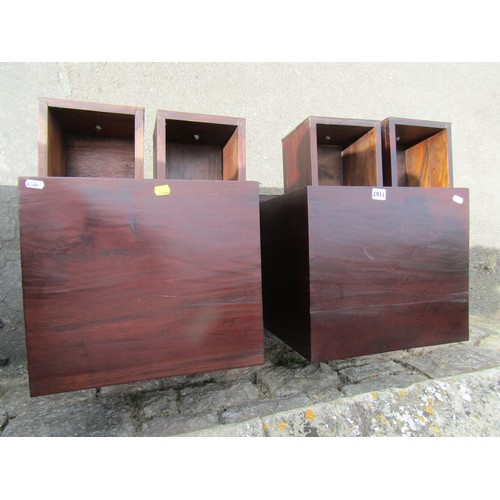 1167 - A pair of contemporary hardwood chests each enclosing four drawers, on shaped supports, 46cm wide x ... 