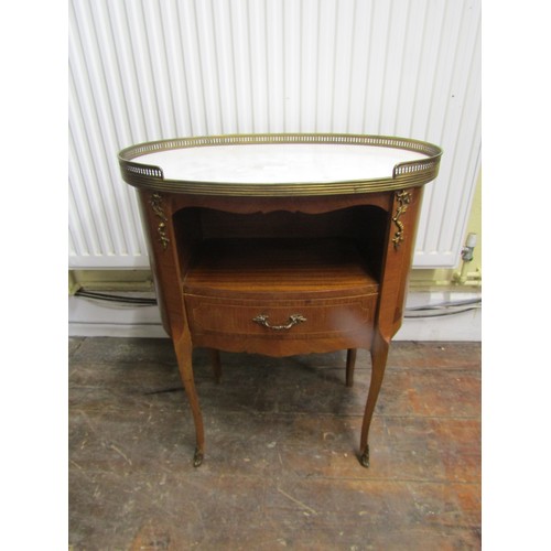 1435 - A French 18th century style oval top bedside table with open centre over a single drawer beneath a w... 