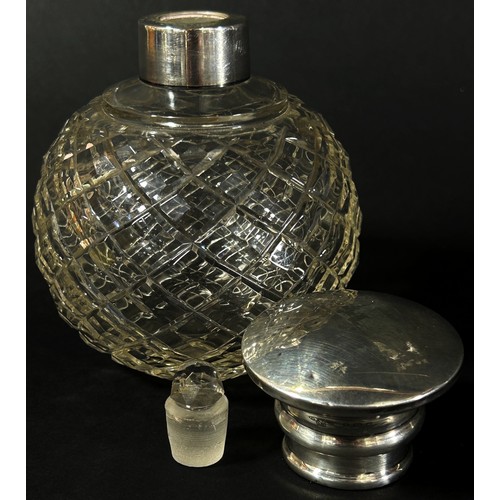 206 - A silver capped glass dressing table bottle London 1925 and a small glass perfume bottle with a silv... 