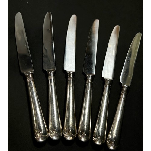 214 - Six silver handled main knives and six side knives to match, Sheffield 1985, maker Strickett & Loder... 