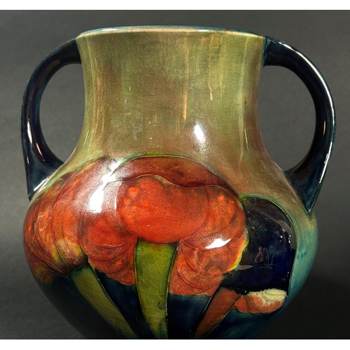 13 - A William Moorcroft twin handled squat baluster vase, decorated with mushrooms, with signature and i... 