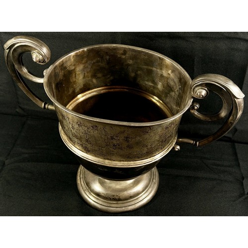 227 - A large double handled silver trophy engraved 