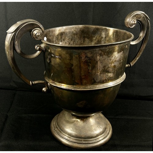 227 - A large double handled silver trophy engraved 