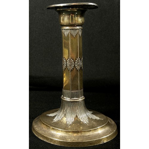 238 - A pair of silver candlesticks of octagonal column form on an oval stepped base, Sheffield 1904 maker... 