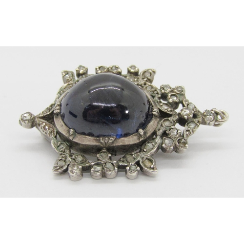 389 - 19th century silver brooch / pendant collet set with a large cabochon sapphire within rose-cut diamo... 