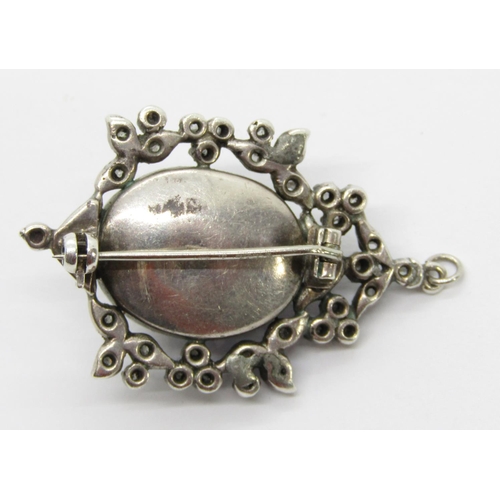 389 - 19th century silver brooch / pendant collet set with a large cabochon sapphire within rose-cut diamo... 