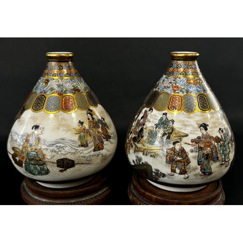 44 - A pair of small, good quality satsuma vases cylindrical tapering tear shape form, each decorated wit... 