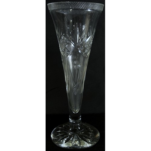 156 - A pair of tall trumpet shaped cut glass vases on a flared base, 33cm tall, (small chip to one on lip... 