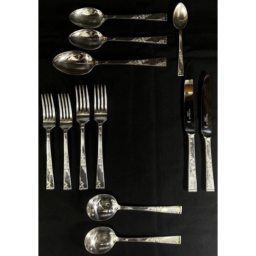 182 - A canteen of cutlery for six settings, main knives, side knives main and side forks, dessert spoons,... 